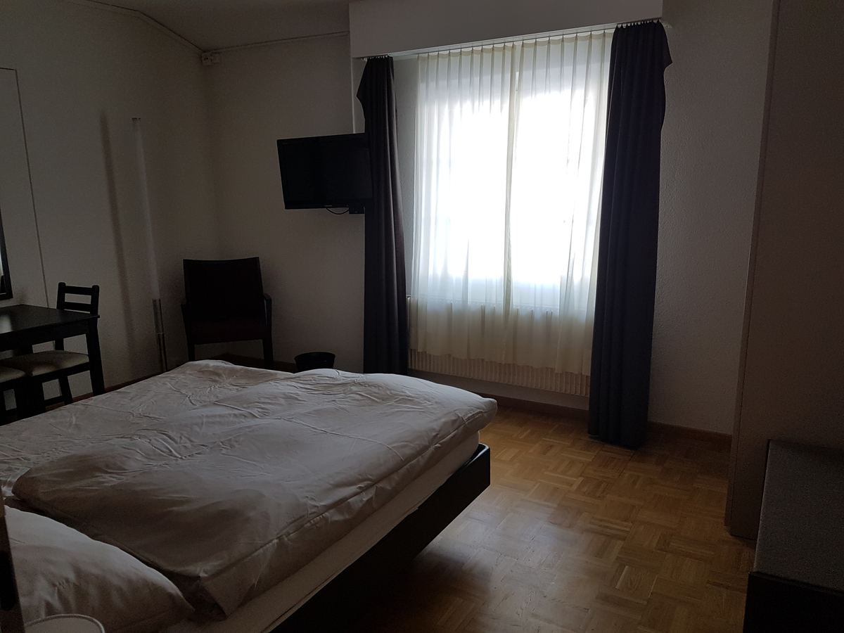 Chambre confort avec grand lit