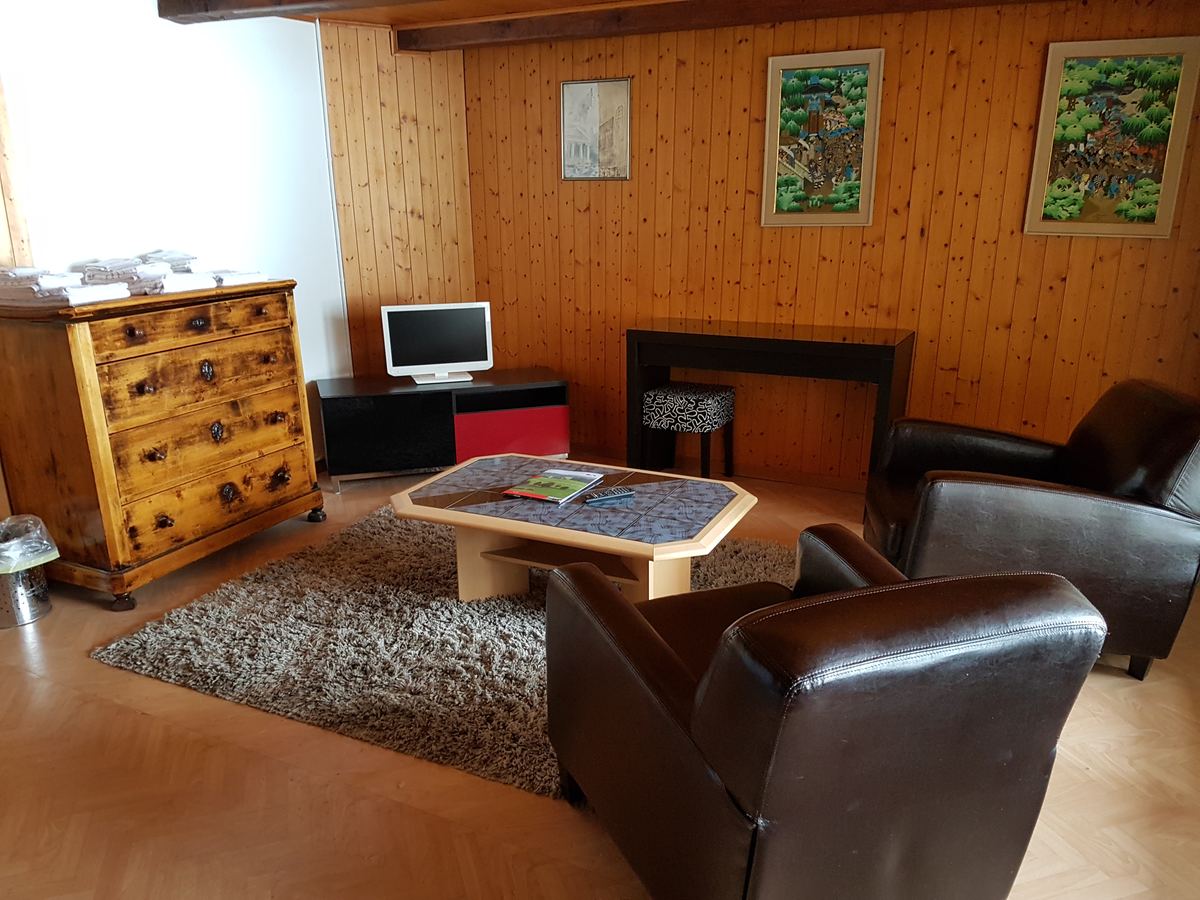 Coin salon d'une chambre standard